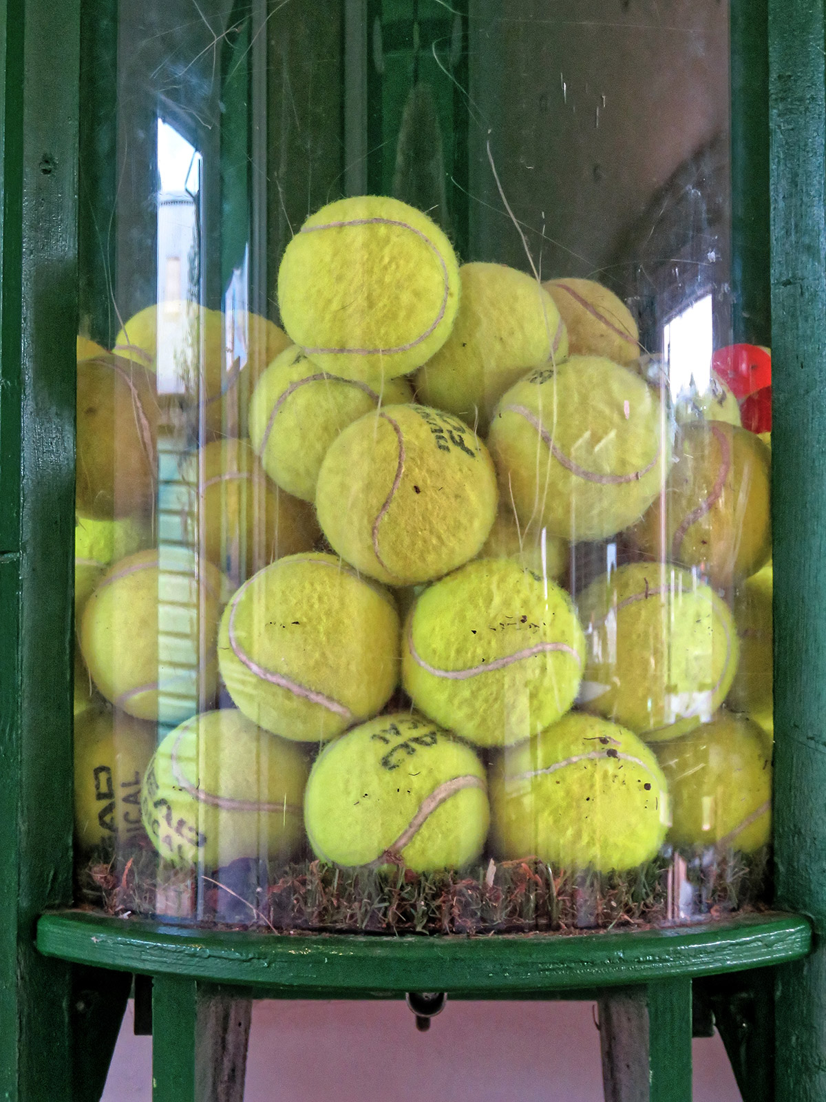 Display unit for lost and found tennis balls, for reuse at Highgate Cricket Club in August 2021, in Crouch End, Haringey, London, England.
